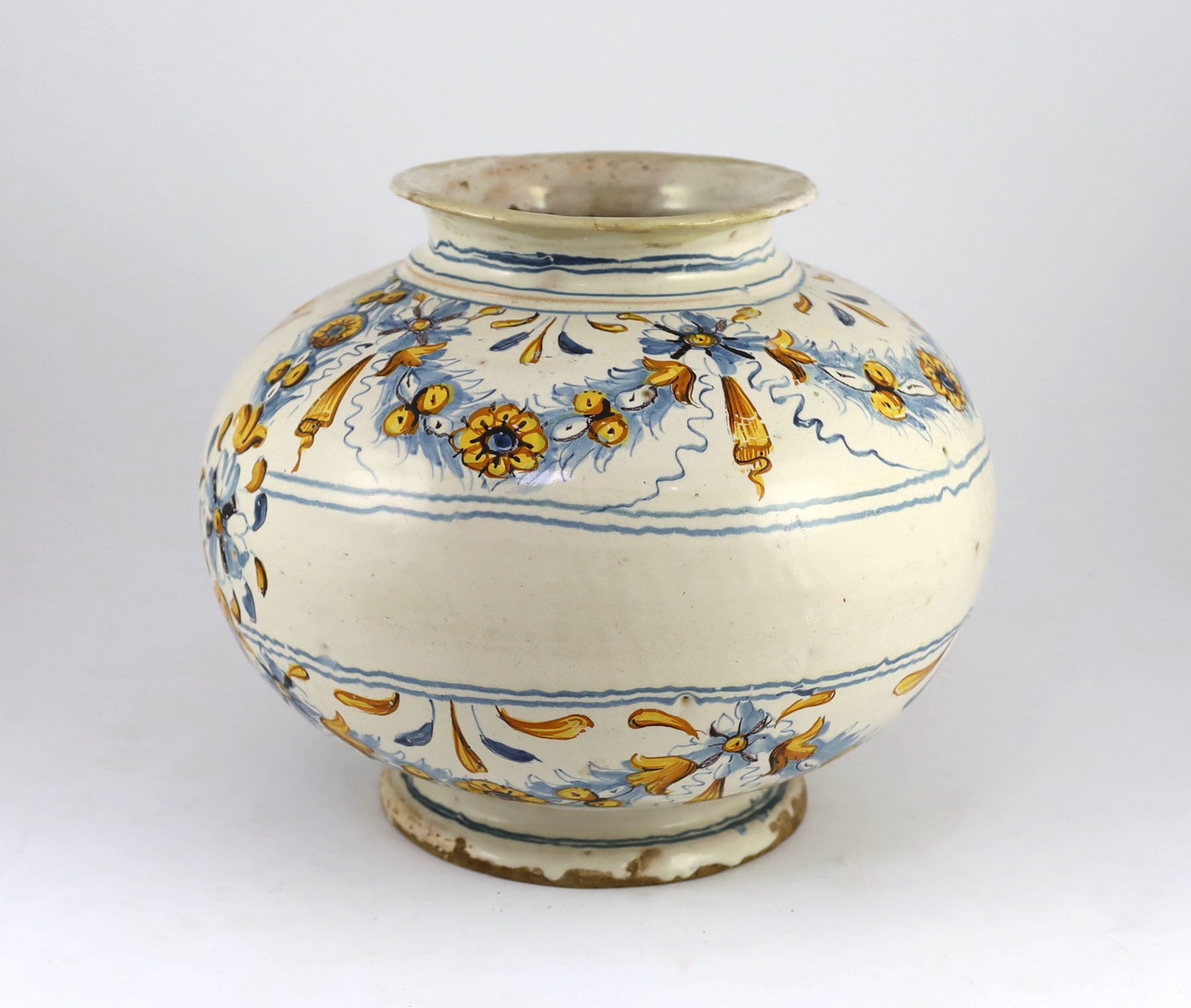 A large Italian maiolica bombola, 18th century, possibly Sicilian, 35cm diameter, 29.5cm high, some restoration, crack to base